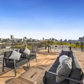 a view of a terrace with seating area