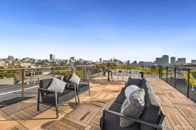 a view of a terrace with seating area