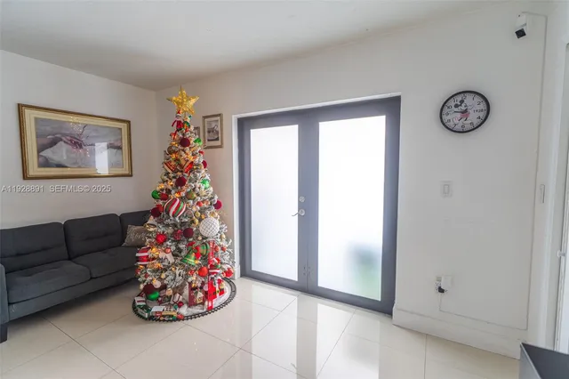 a bedroom with a bed and a chair