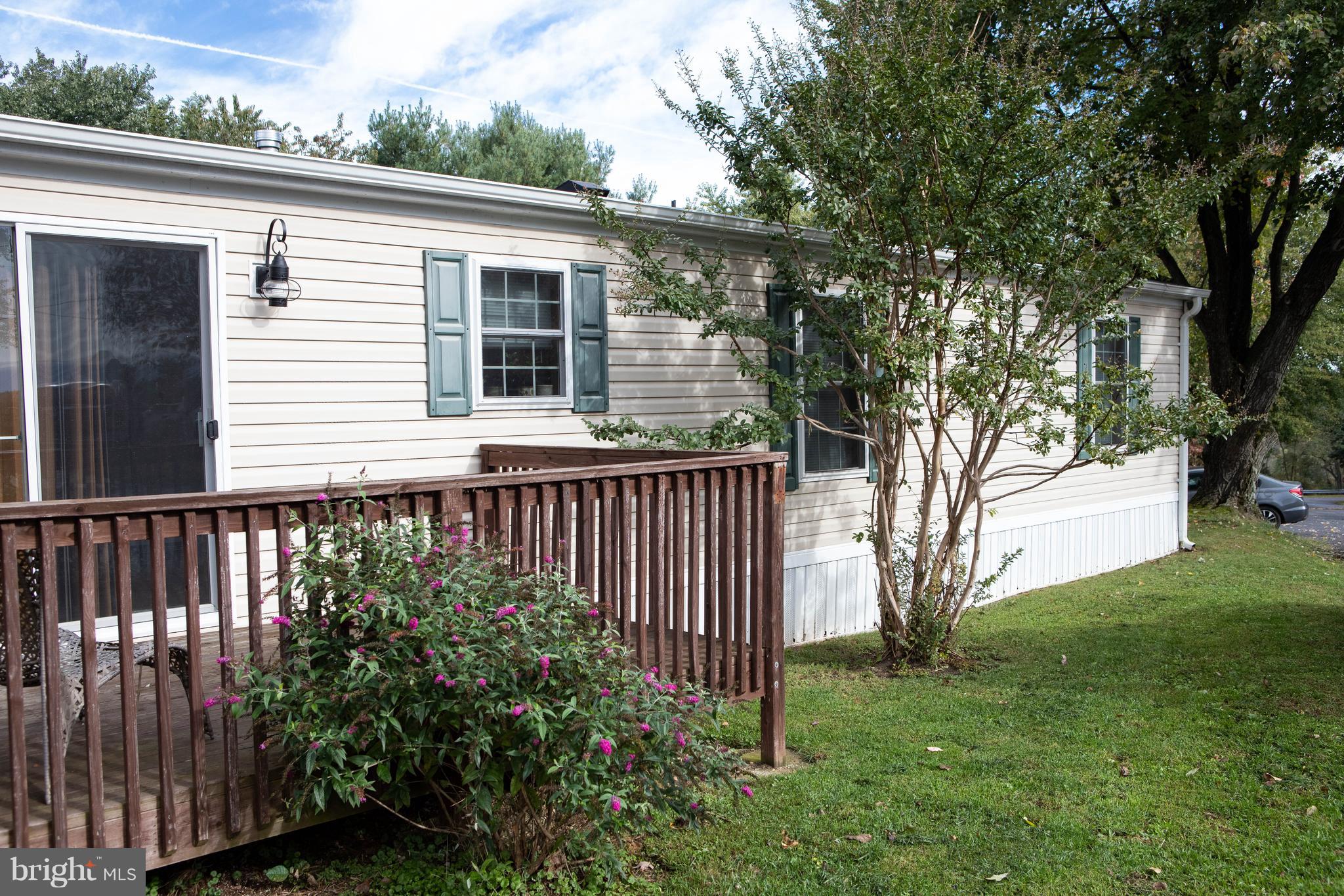 4312 Ridge Drive Mount Airy, MD 21771 - Photo 5 of 24 Front Side of Home with Deck