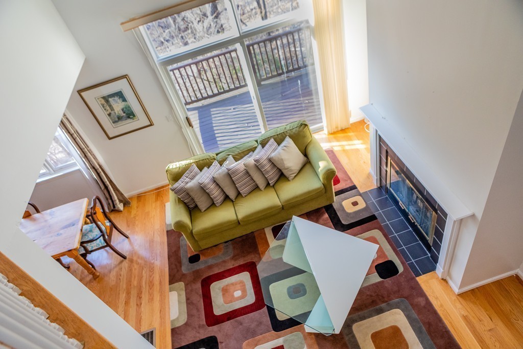 85 Bishops Forest Drive, Unit 85 Waltham, MA 02452 - Photo 14 of 32 a living room with furniture and a window