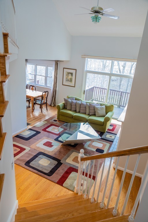 85 Bishops Forest Drive, Unit 85 Waltham, MA 02452 - Photo 16 of 32 a living room with furniture and a window