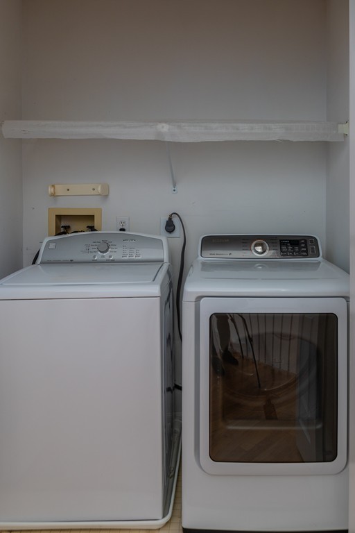 85 Bishops Forest Drive, Unit 85 Waltham, MA 02452 - Photo 26 of 32 a utility room with dryer and washer