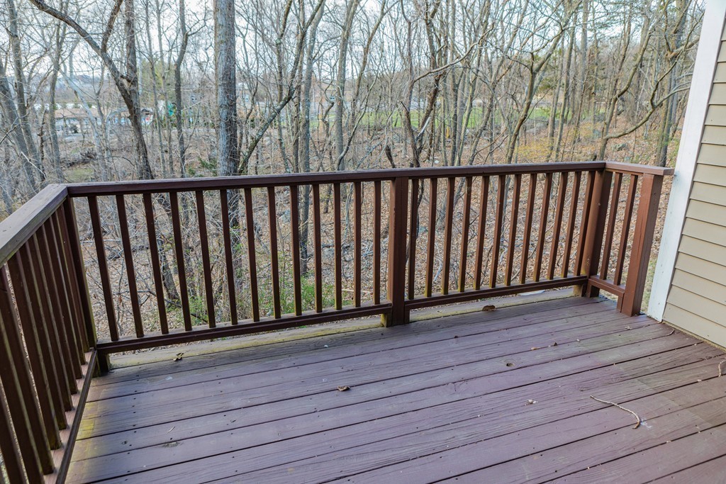 85 Bishops Forest Drive, Unit 85 Waltham, MA 02452 - Photo 30 of 32 a view of wooden deck