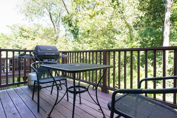85 Bishops Forest Drive, Unit 85 Waltham, MA 02452 - Photo 31 of 32 a view of a balcony with chairs