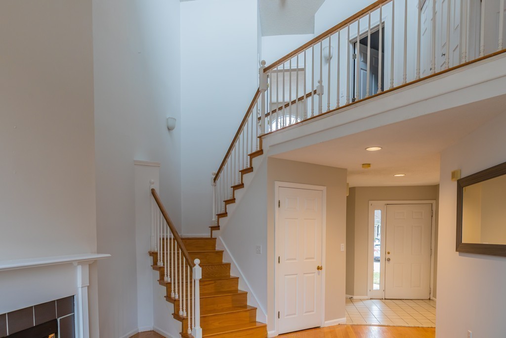 85 Bishops Forest Drive, Unit 85 Waltham, MA 02452 - Photo 8 of 32 a view of an entryway with wooden floor