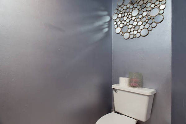 85 Bishops Forest Drive, Unit 85 Waltham, MA 02452 - Photo 10 of 32 a white toilet sitting next to a white wall