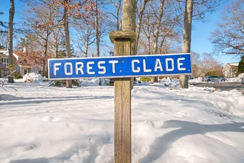 a street sign on a pole on a street