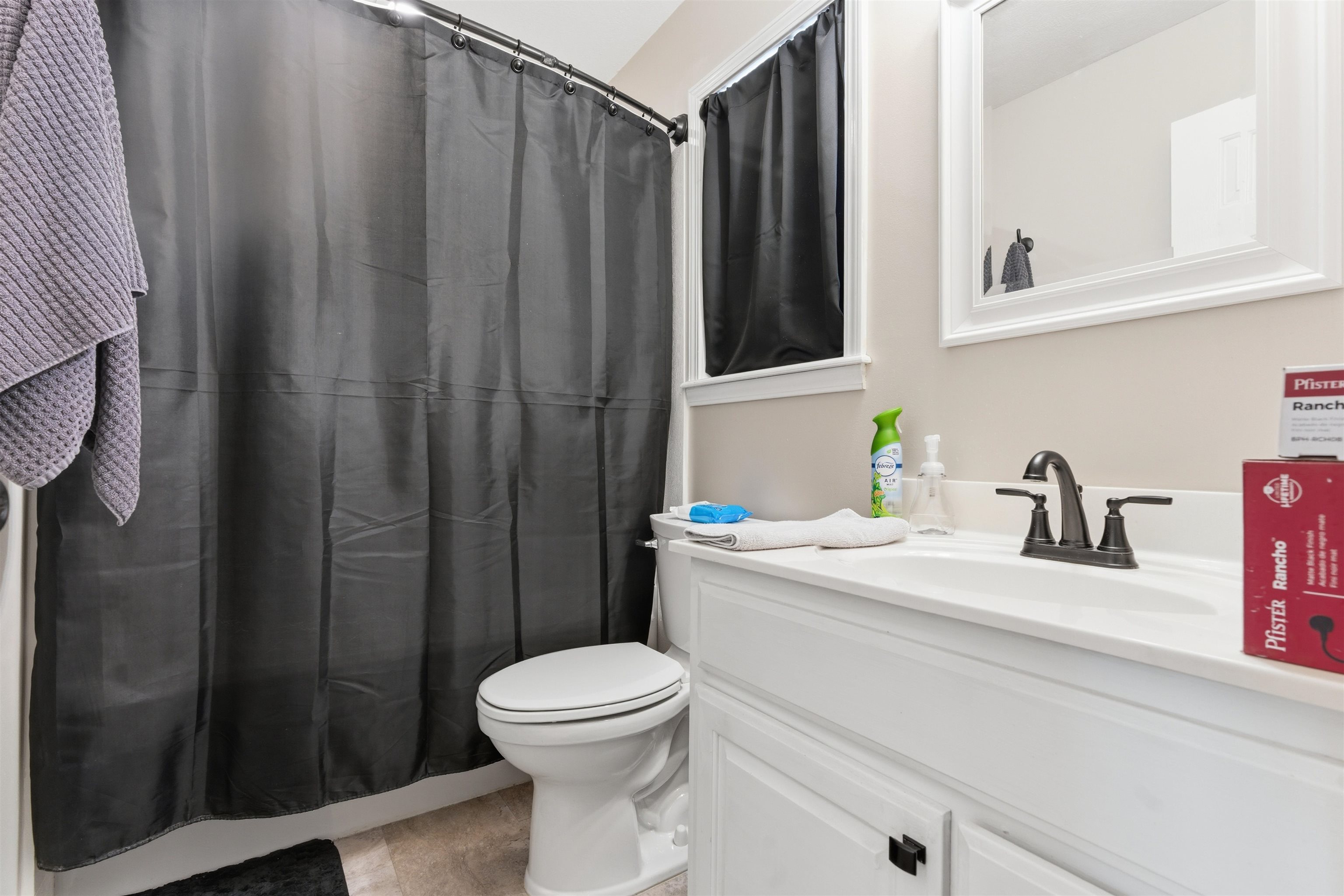 448 Stevens Road Bolivar, TN 38008 - Photo 21 of 25 Bathroom featuring a shower with curtain and vanity