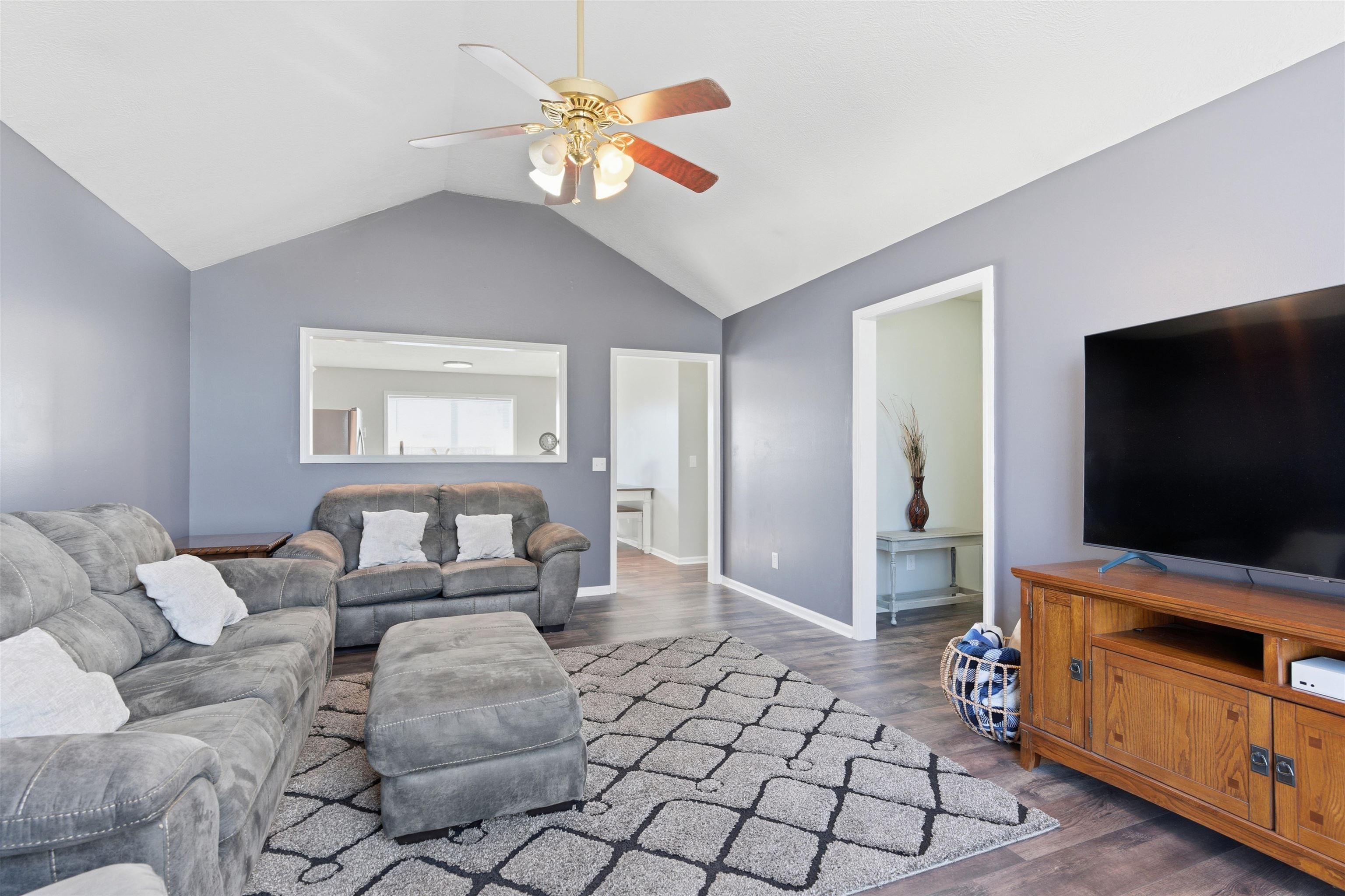 448 Stevens Road Bolivar, TN 38008 - Photo 8 of 25 Living room with ceiling fan and dark wood finished floors