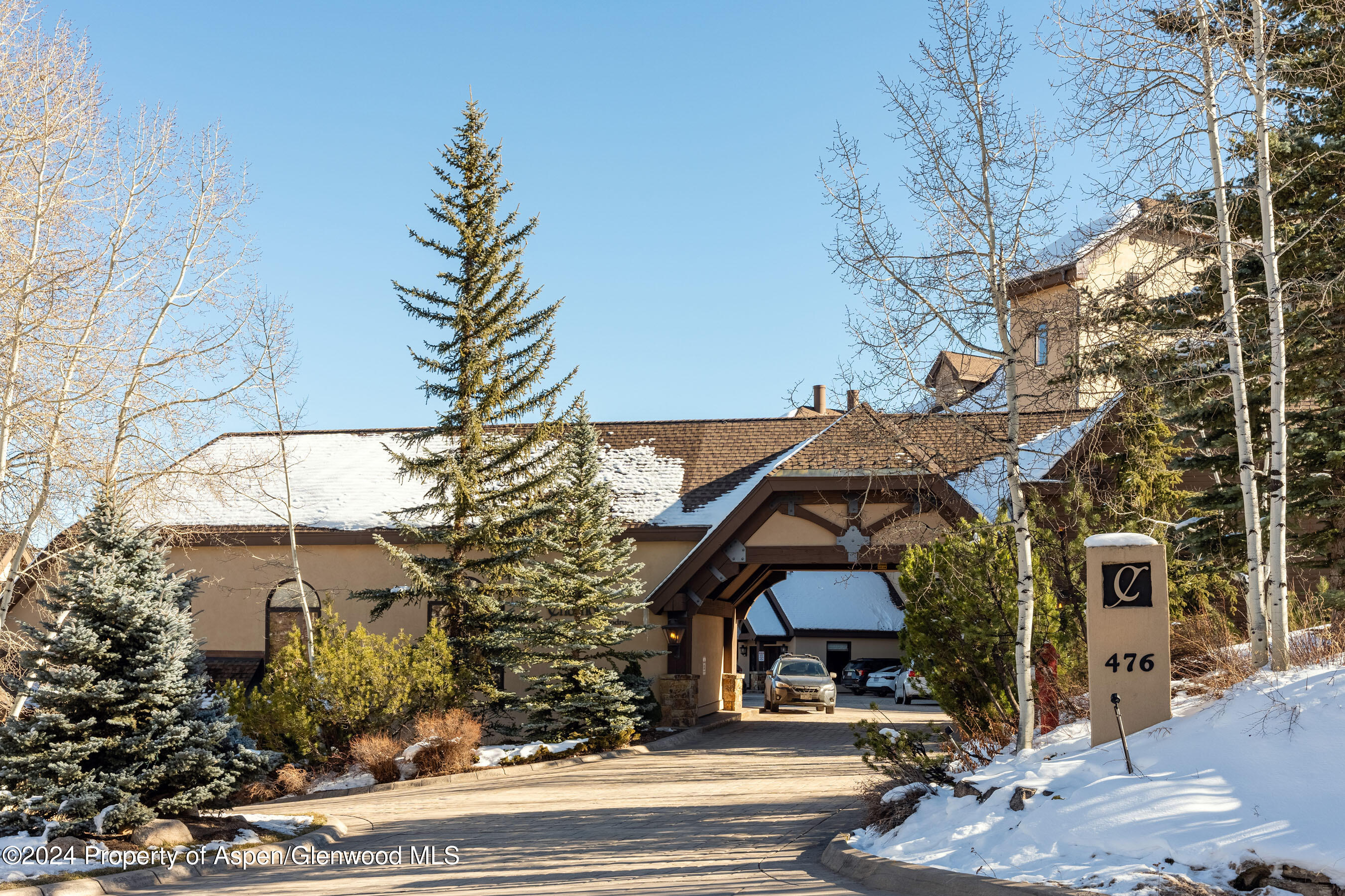 476 Wood Road, Unit 41 Snowmass Village, CO 81615 - Photo 22 of 29 a front view of a house