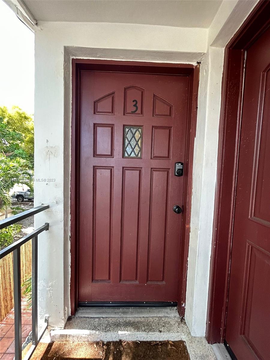 46 Northwest 35th Street Miami, FL 33127 - Photo 11 of 17 a view of front door of a house