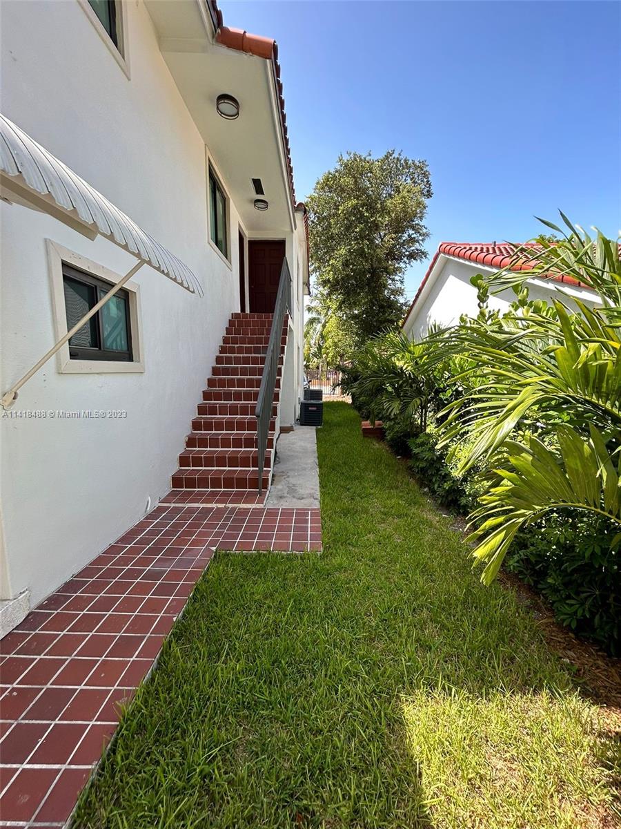 46 Northwest 35th Street Miami, FL 33127 - Photo 13 of 17 a view of a house with a yard
