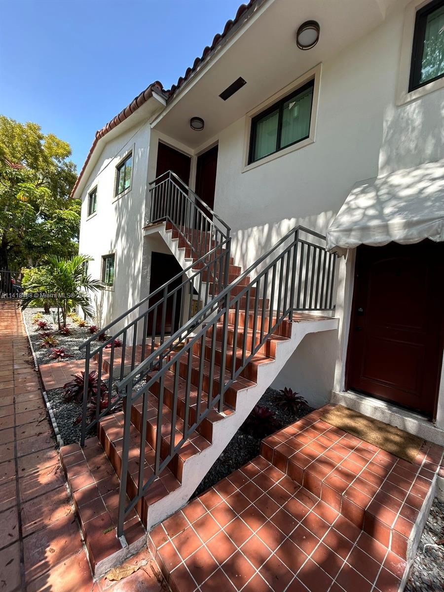 46 Northwest 35th Street Miami, FL 33127 - Photo 15 of 17 a view of entryway with wooden floor