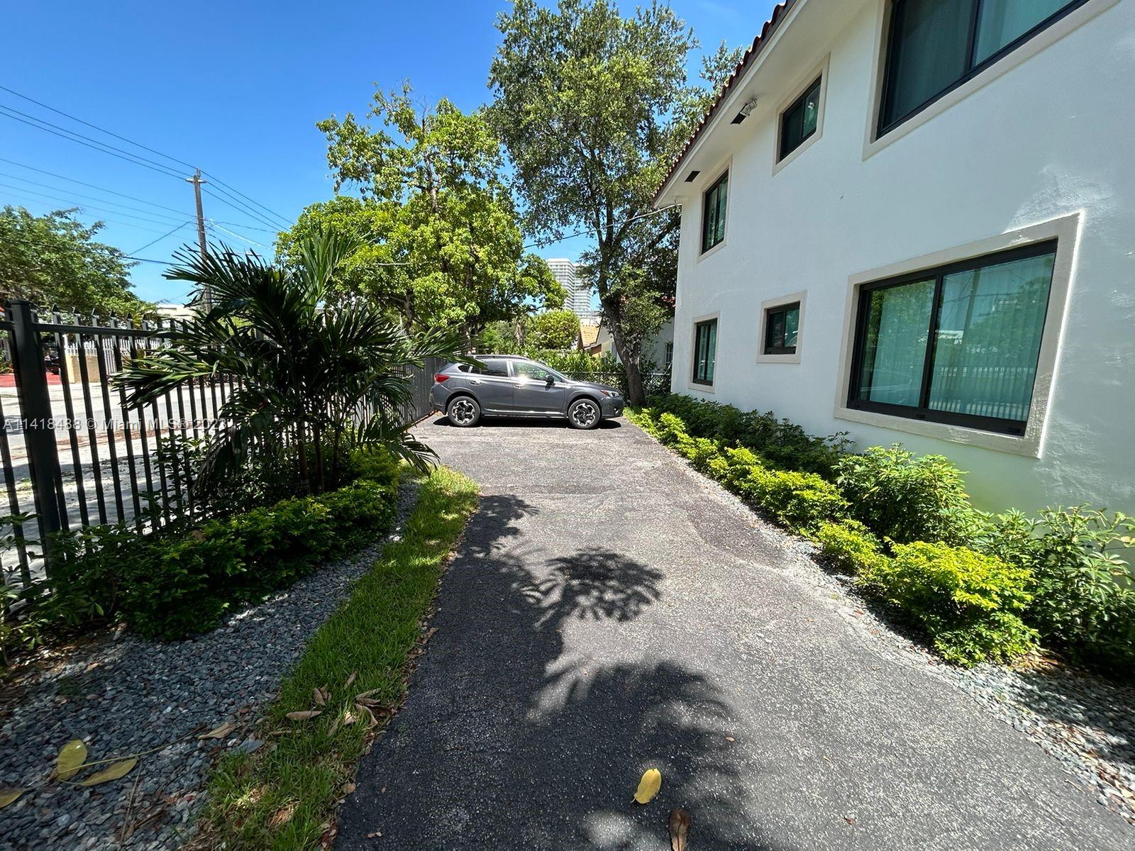 46 Northwest 35th Street Miami, FL 33127 - Photo 16 of 17 a view of a back yard of the house