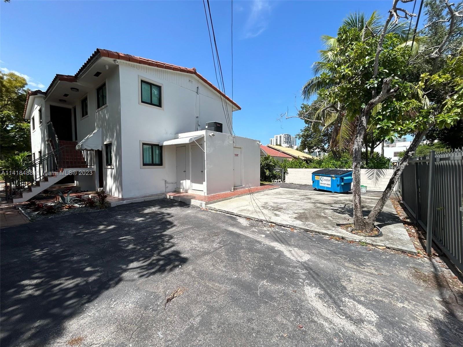 46 Northwest 35th Street Miami, FL 33127 - Photo 3 of 17 a view of a house with a yard