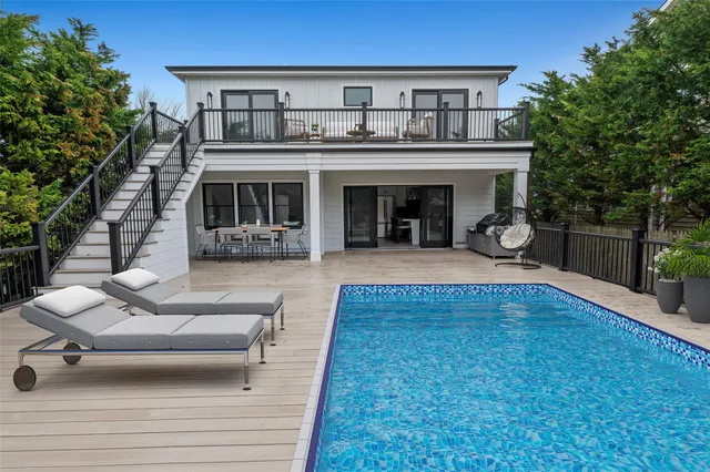 a view of house with outdoor seating space