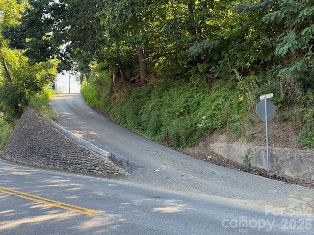 a view of a street with a trees