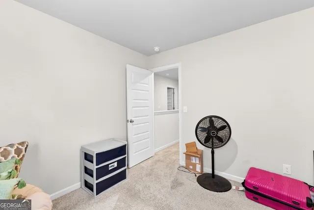 a view of a room with racks on the wall