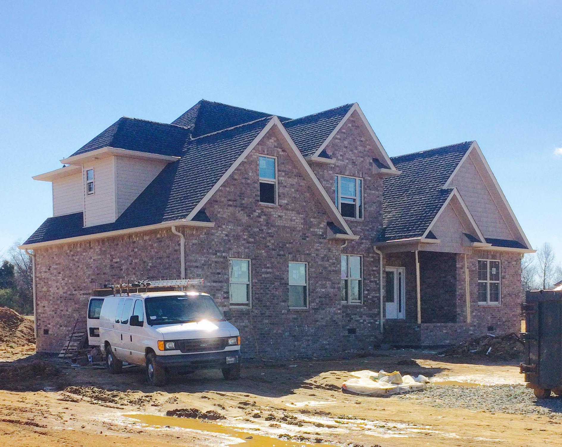 445 Tom Link Road Cottontown, TN 37048 - Photo 1 of 1 a front view of a house with a yard