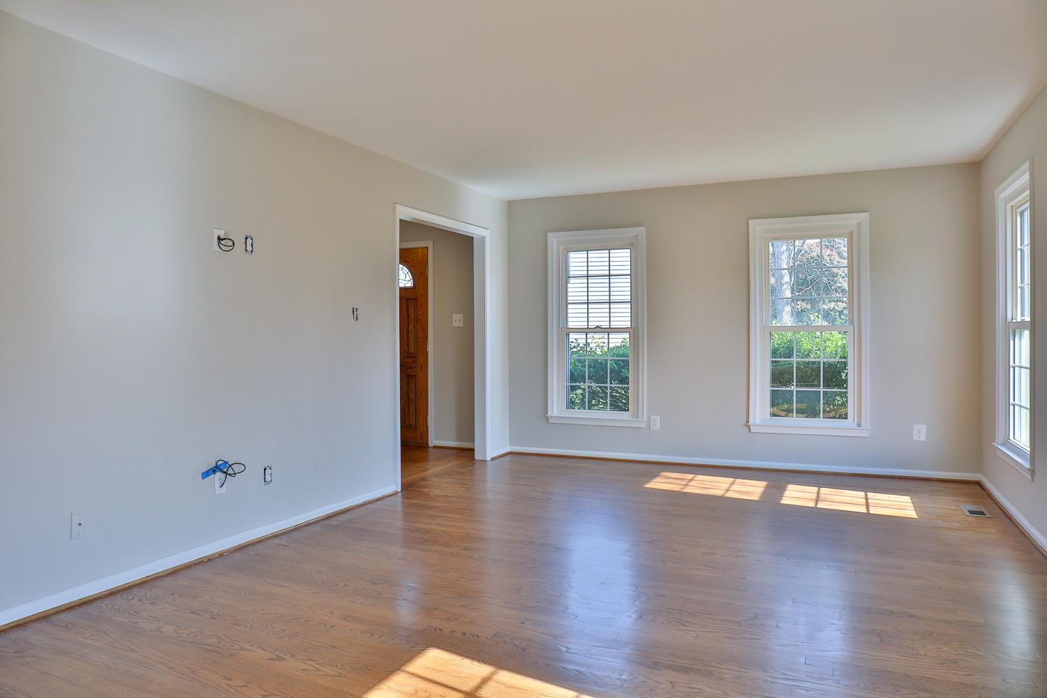 5423 Rilian Court Burke, VA 22015 - Photo 16 of 67 an empty room with wooden floor and windows