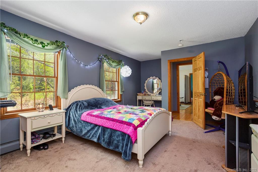 37 Hidden Hill Road New Hartford, CT 06057 - Photo 24 of 36 a bedroom with a bed and a window