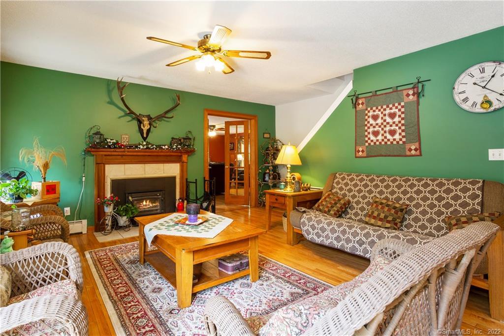 37 Hidden Hill Road New Hartford, CT 06057 - Photo 6 of 36 a living room with furniture and a fireplace