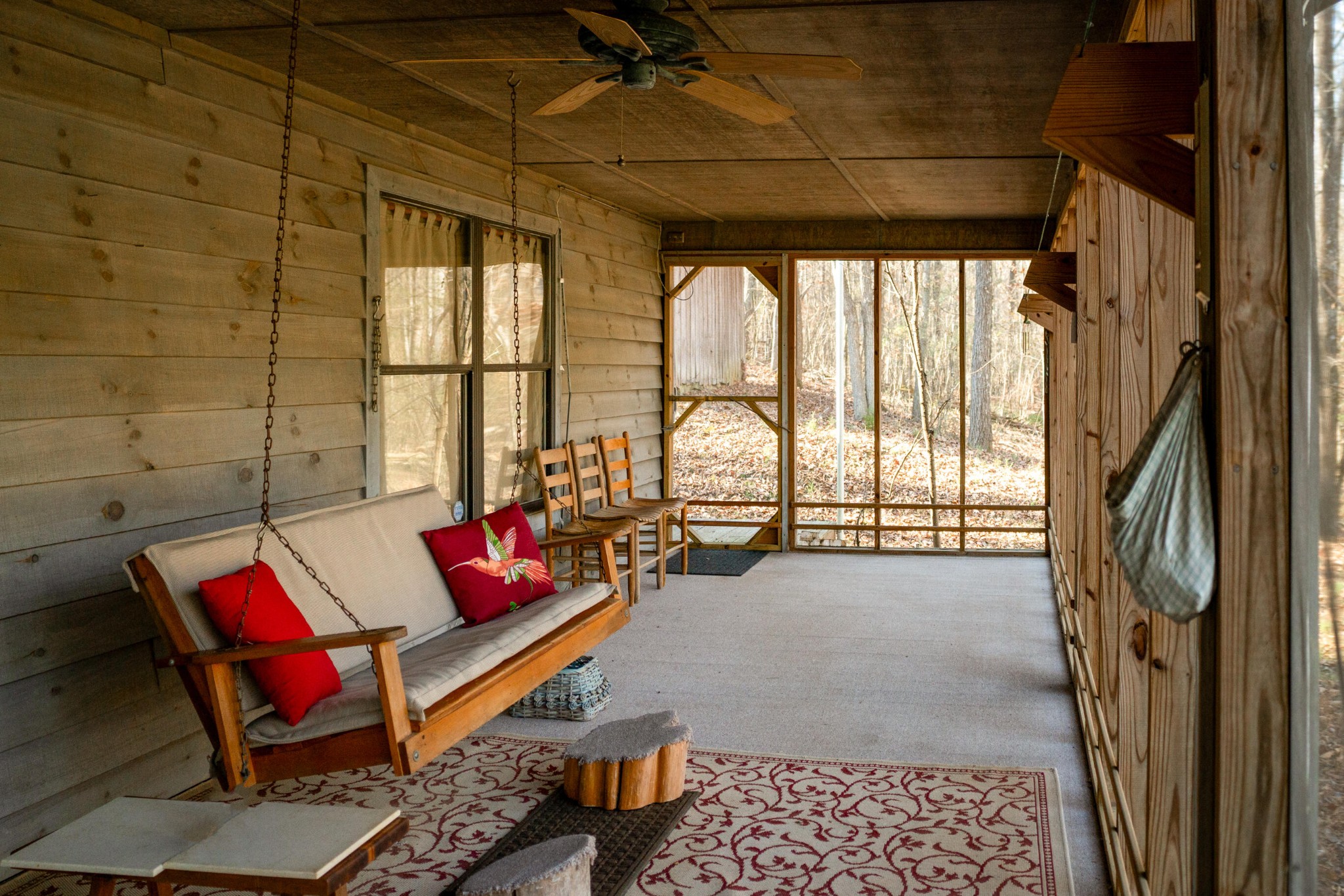 11405 Highway 58 Georgetown, TN 37336 - Photo 11 of 70 a living room with furniture and a floor to ceiling window