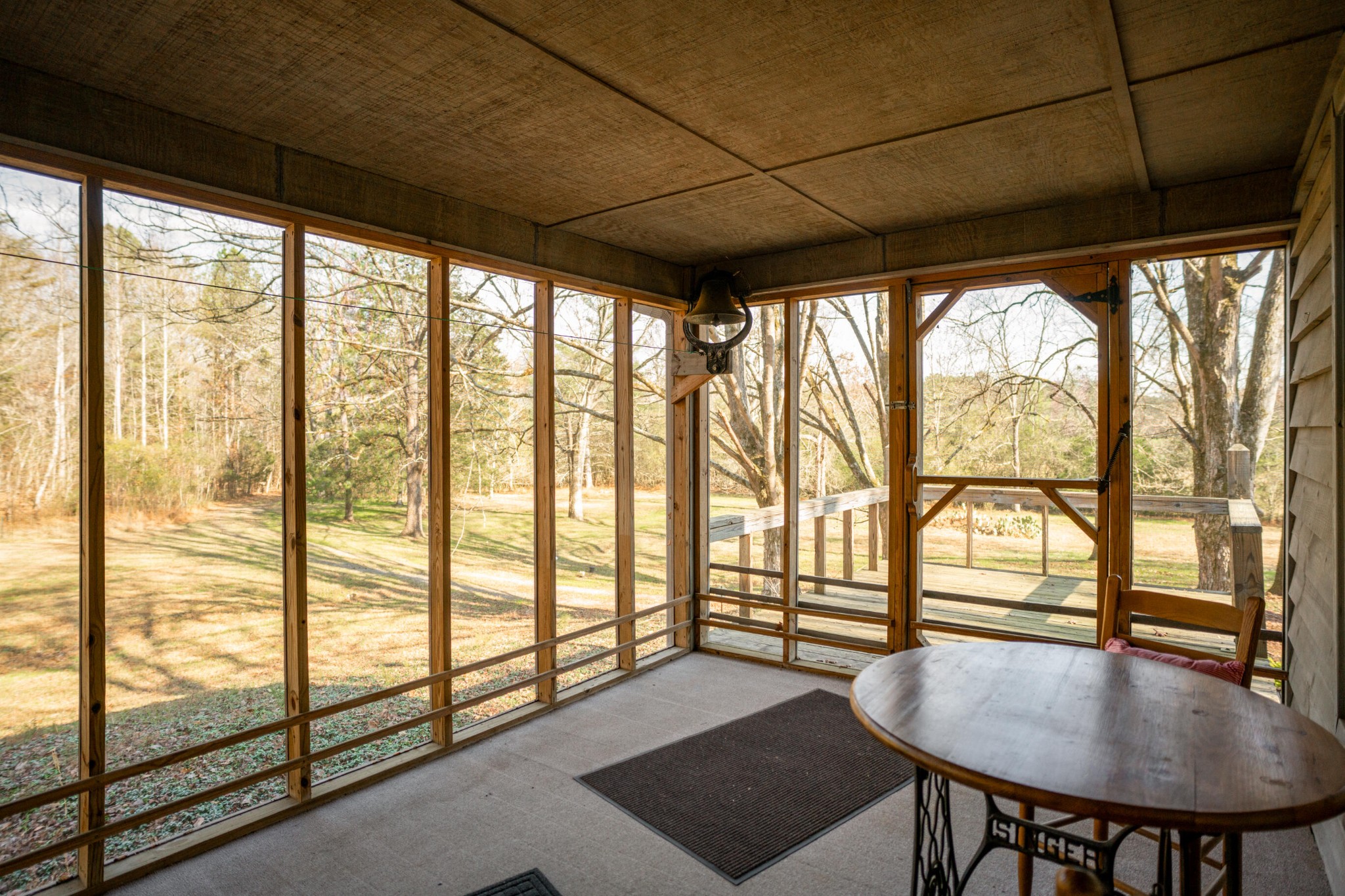 11405 Highway 58 Georgetown, TN 37336 - Photo 16 of 70 a view of a room with furniture and wooden floor