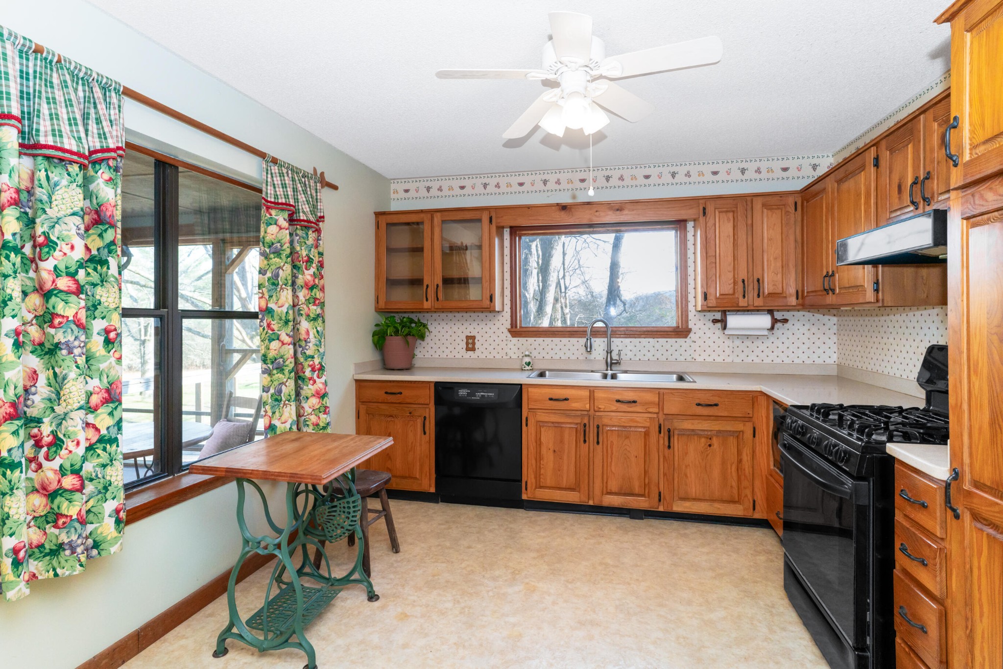 11405 Highway 58 Georgetown, TN 37336 - Photo 44 of 70 a kitchen with granite countertop a sink appliances a window and dining table