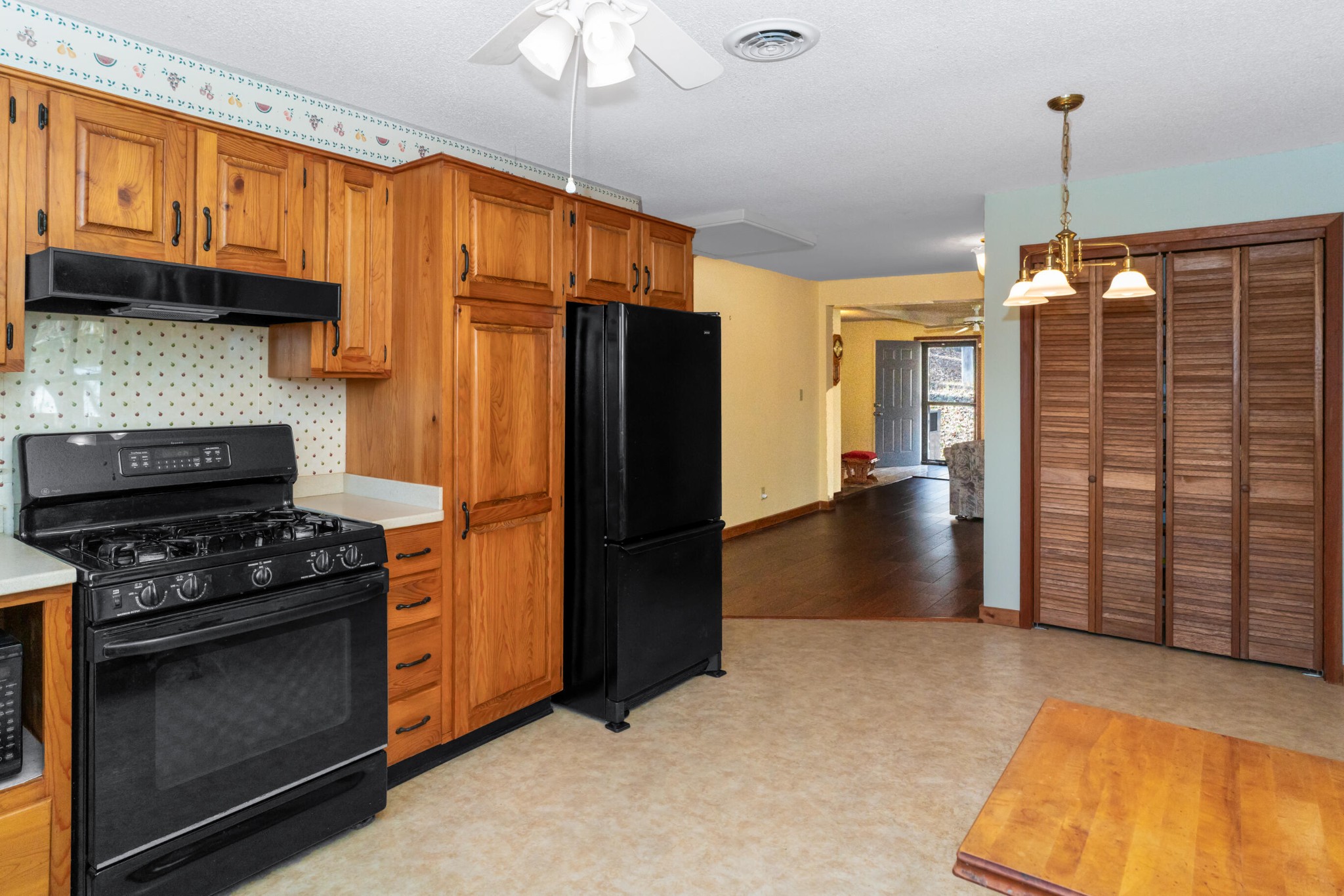 11405 Highway 58 Georgetown, TN 37336 - Photo 45 of 70 a kitchen with stainless steel appliances granite countertop a refrigerator a stove and a sink