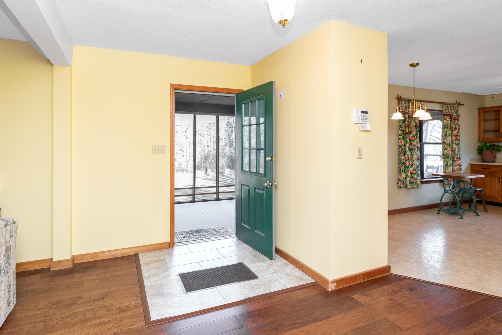 11405 Highway 58 Georgetown, TN 37336 - Photo 46 of 70 a view of a hallway with wooden floor and a living room