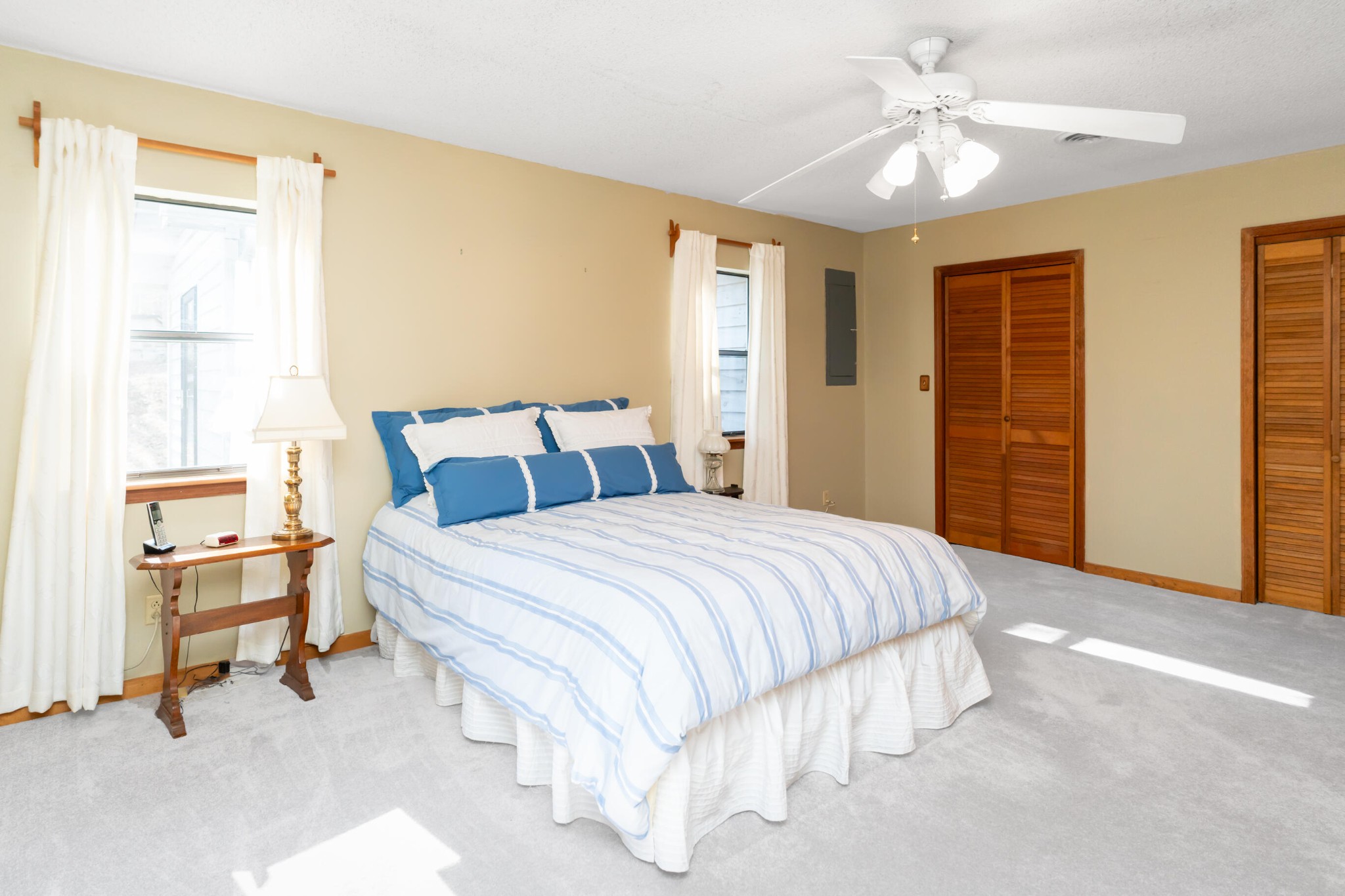 11405 Highway 58 Georgetown, TN 37336 - Photo 54 of 70 a bedroom with a bed and a chandelier