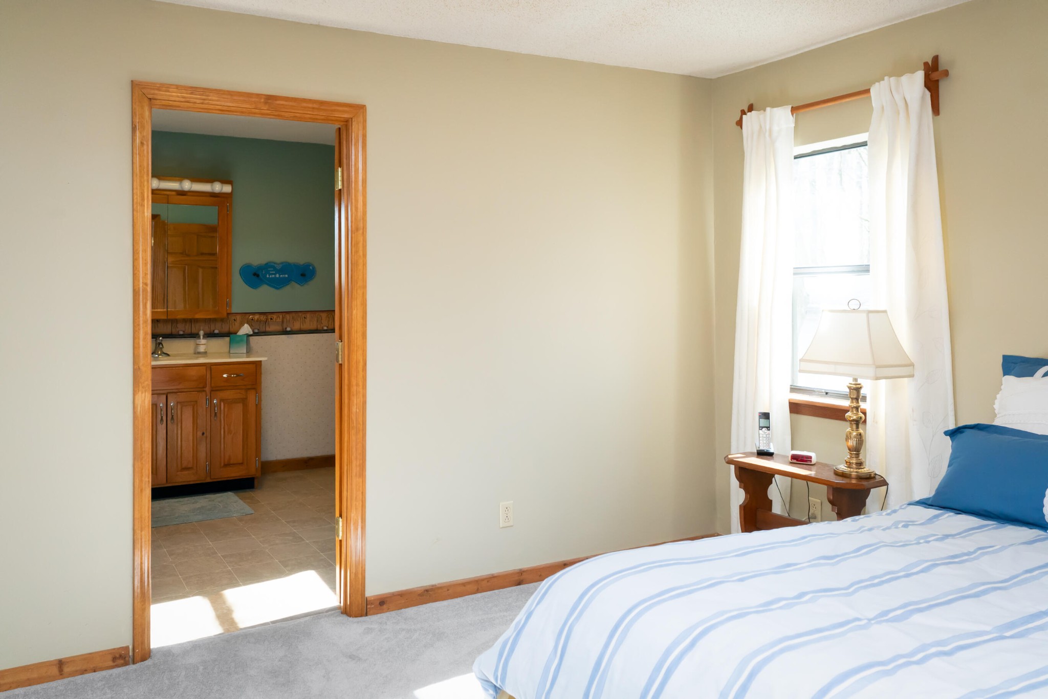 11405 Highway 58 Georgetown, TN 37336 - Photo 55 of 70 a bedroom with a bed and a cabinets