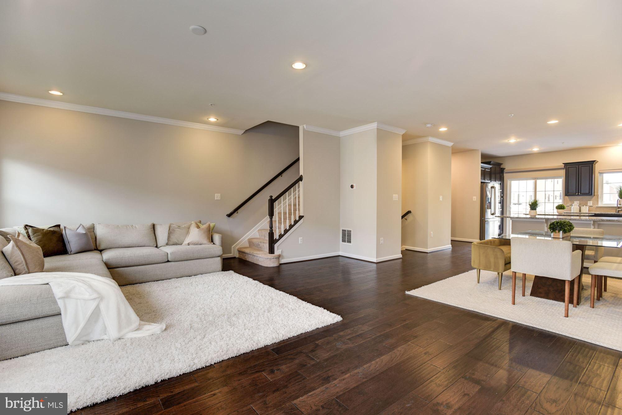 7565 Crowley Street Hanover, MD 21076 - Photo 11 of 40 Living Room | Hardwood | Automatic Shades.