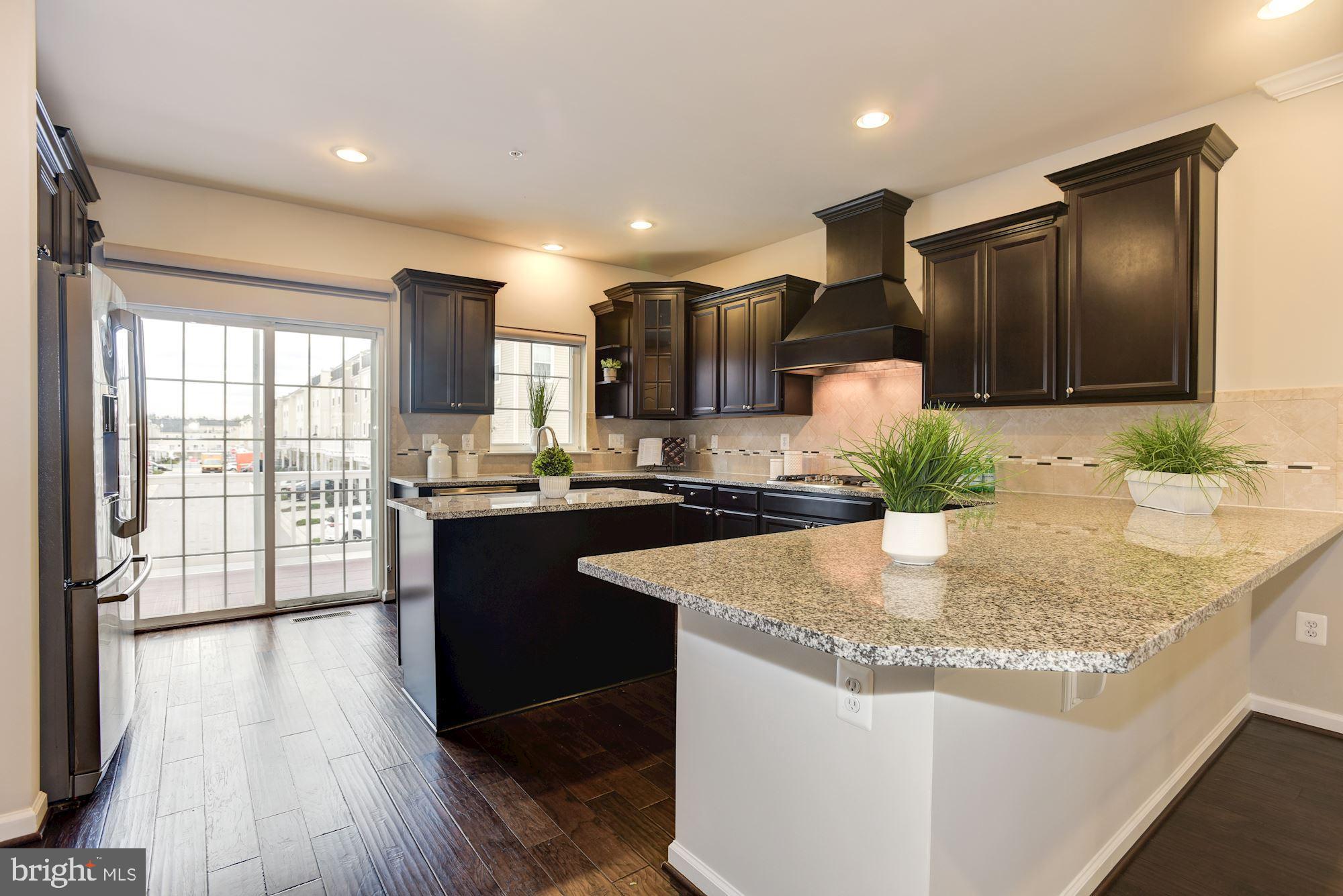 7565 Crowley Street Hanover, MD 21076 - Photo 2 of 40 Upgraded Gourmet Kitchen | Island | Hood.