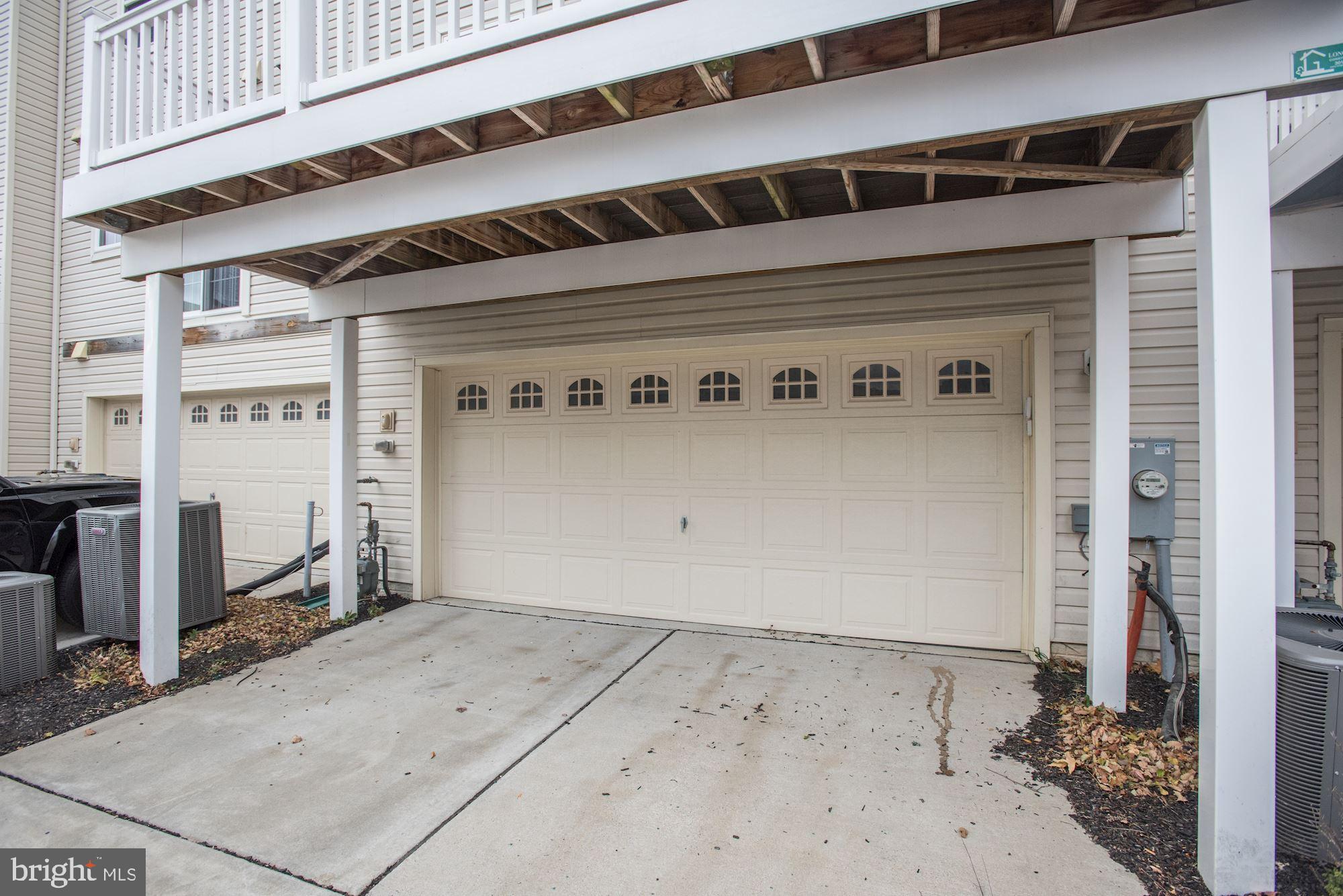7565 Crowley Street Hanover, MD 21076 - Photo 29 of 40 Exterior Rear View | 2 Car Garage & Driveway.