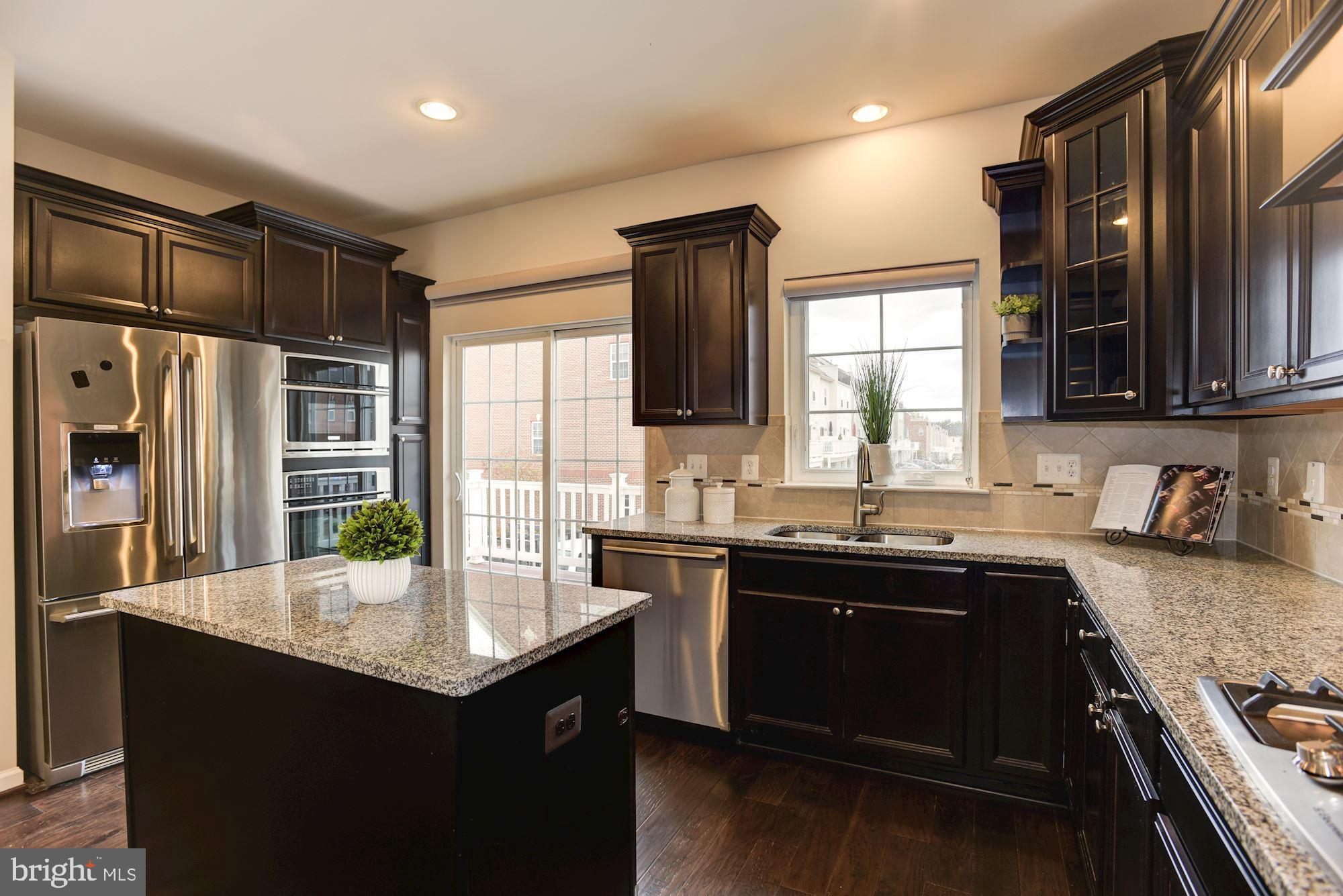 7565 Crowley Street Hanover, MD 21076 - Photo 3 of 40 Massive Kitchen | Double Oven | Entry To Deck.