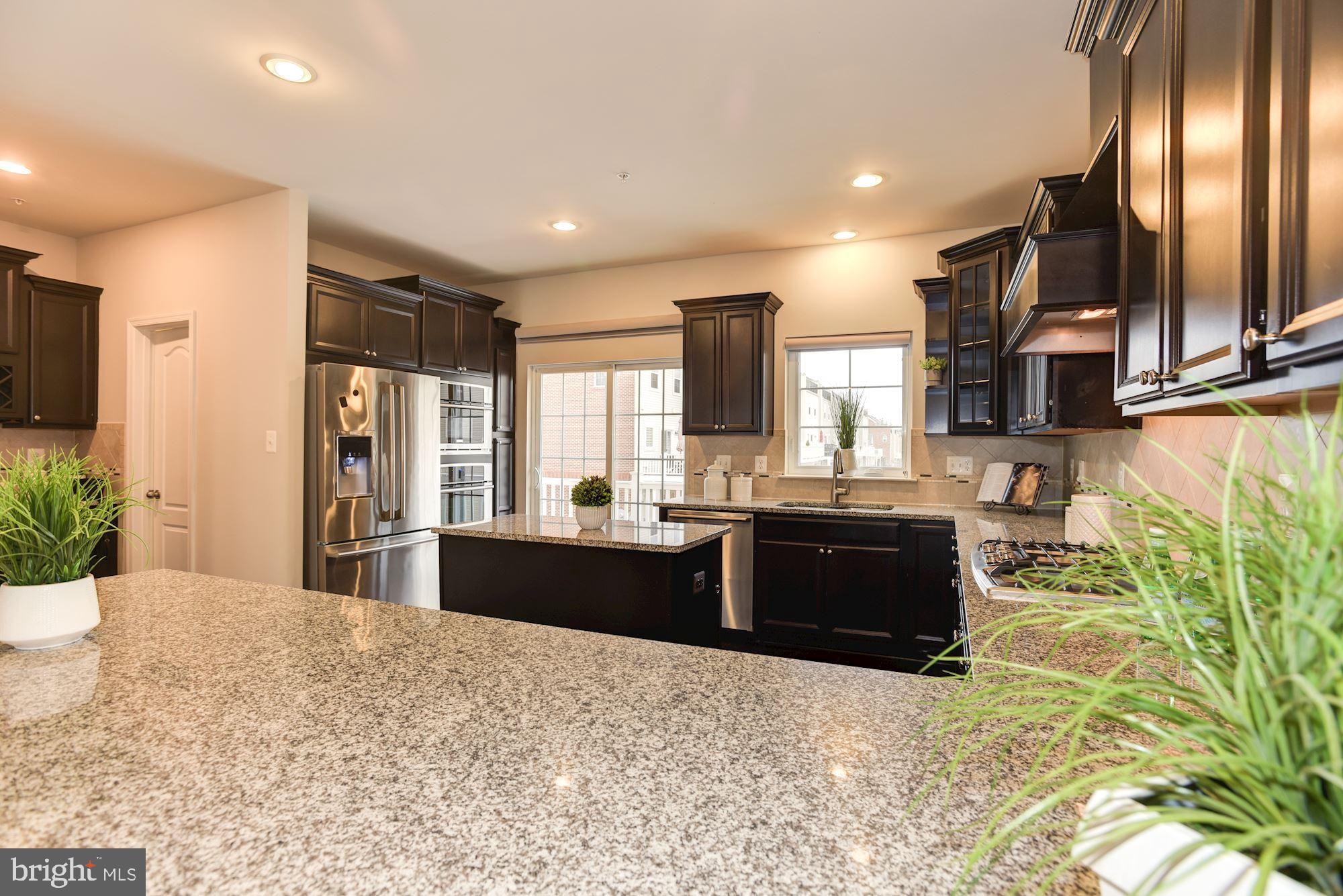 7565 Crowley Street Hanover, MD 21076 - Photo 7 of 40 Kitchen | Automatic Shades.
