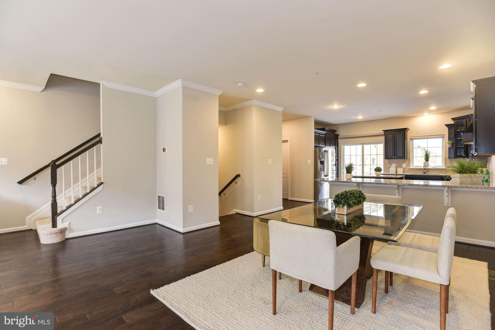 7565 Crowley Street Hanover, MD 21076 - Photo 8 of 40 Dining Room | Engineered Hardwood | Crown Moulding
