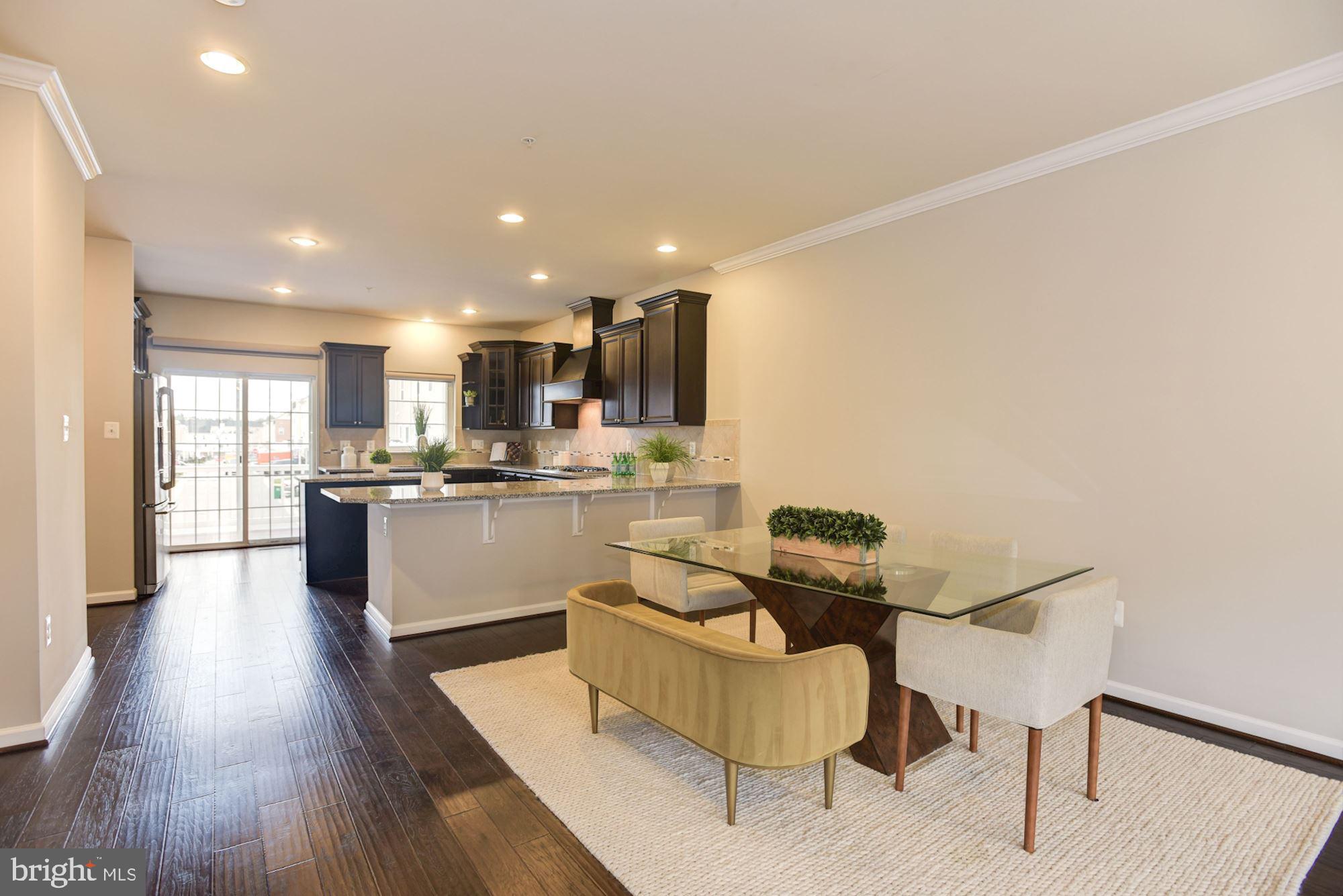 7565 Crowley Street Hanover, MD 21076 - Photo 9 of 40 Dining Room | Engineered Hardwood | Crown Moulding