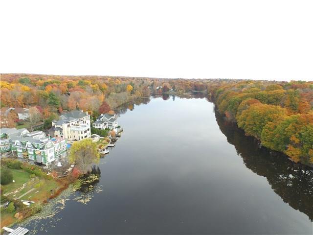 93 Valley Road, Unit B Greenwich, CT 06807 - Photo 1 of 1 a view of a lake in middle of the town