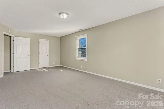 a view of a houses with a balcony