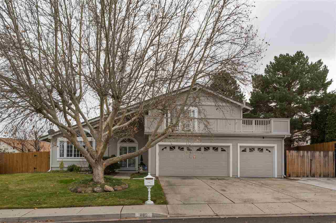 880 Twin Pines Road Reno, NV 89509 - Photo 1 of 1 a large tree in front of a house