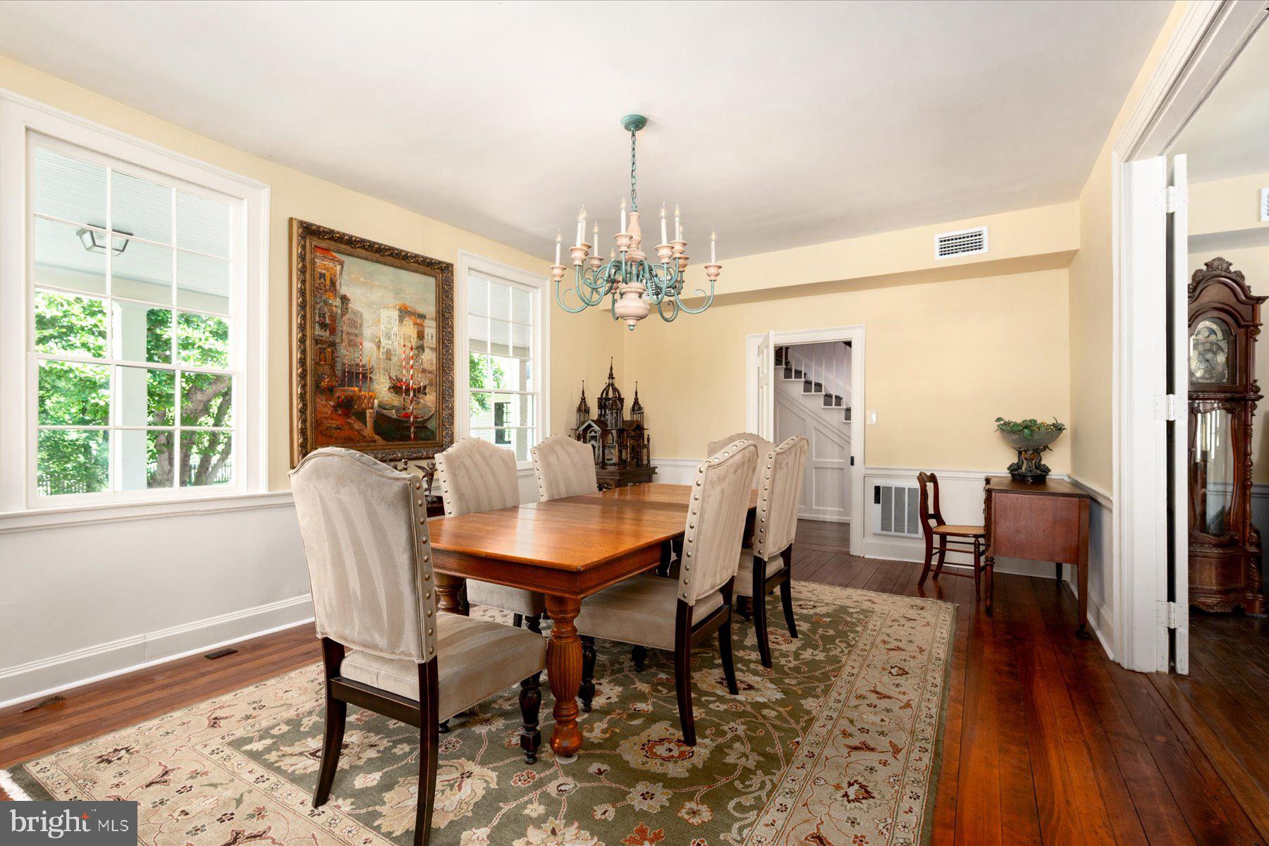 5503 Brooks Woods Road Lothian, MD 20711 - Photo 17 of 99 a view of a dining room with furniture window and wooden floor