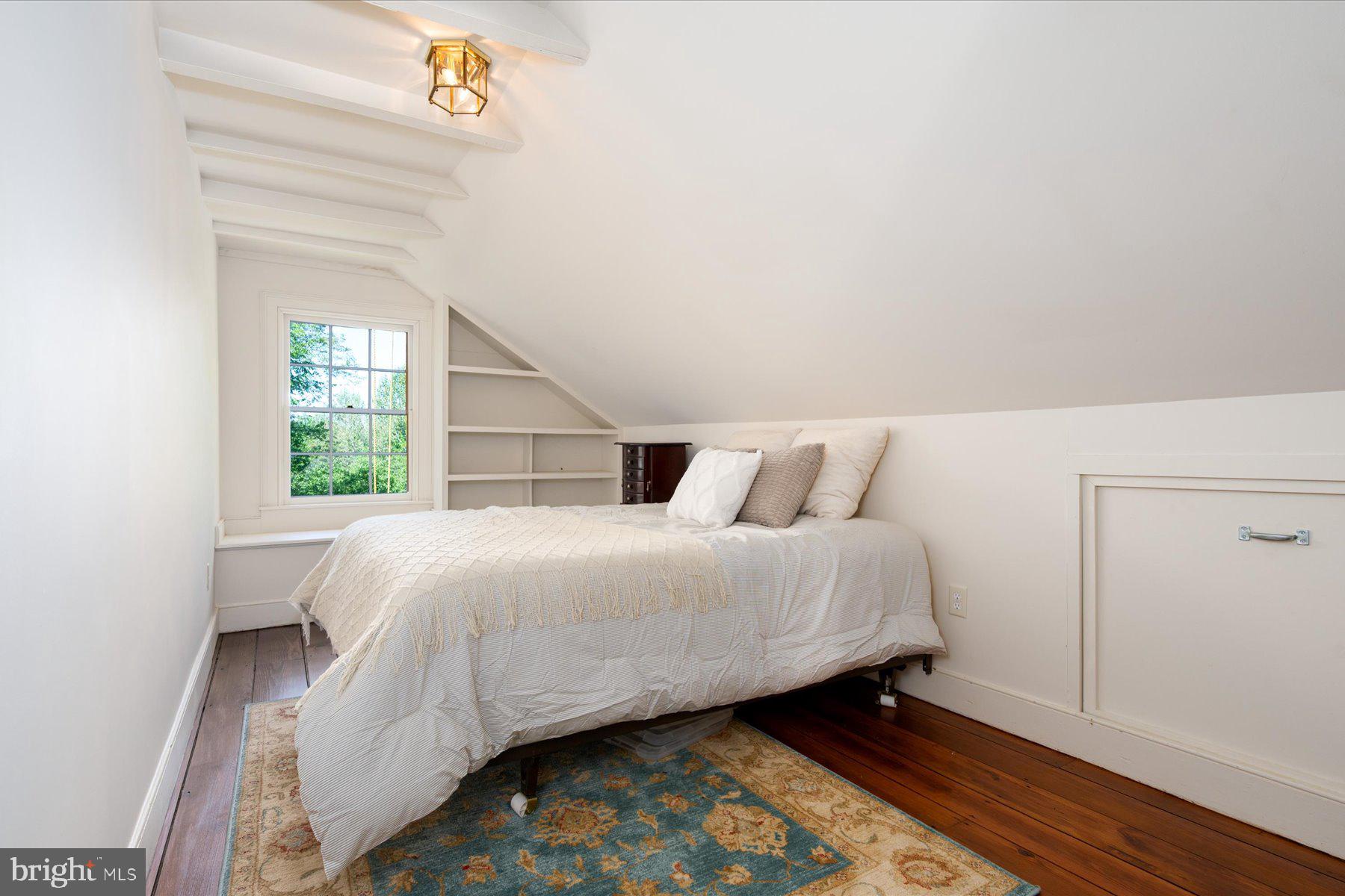 5503 Brooks Woods Road Lothian, MD 20711 - Photo 43 of 99 a bedroom with a bed and a window