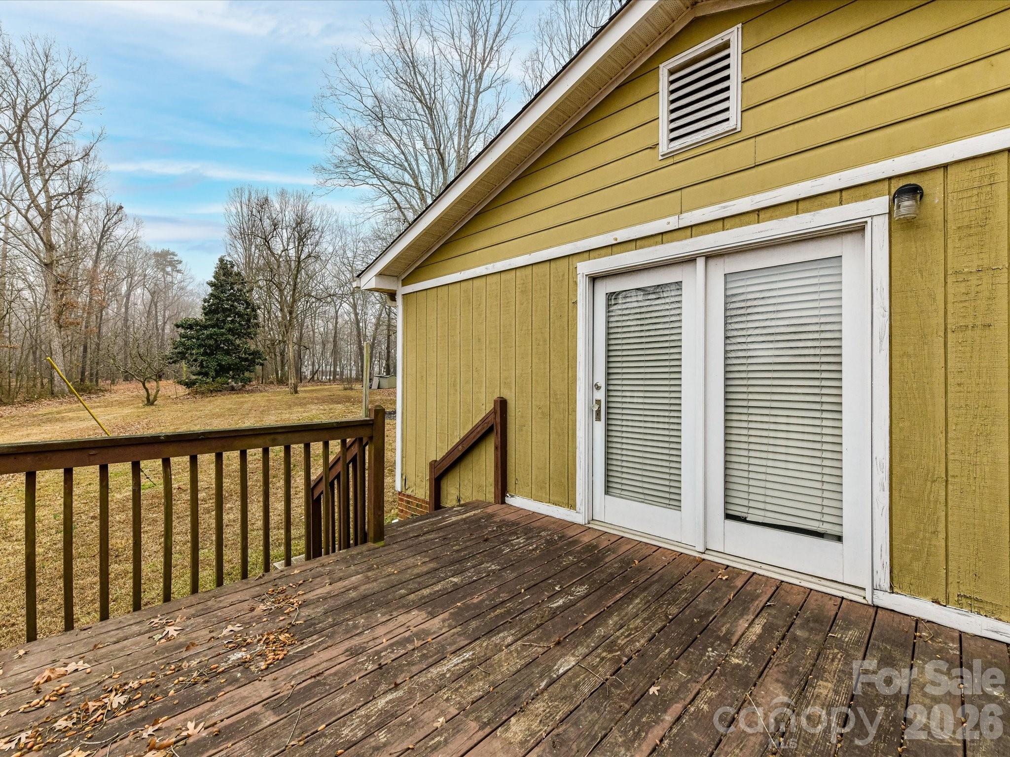 2303 Long Hope Road Monroe, NC 28112 - Photo 28 of 33 a view of a house with a wooden deck