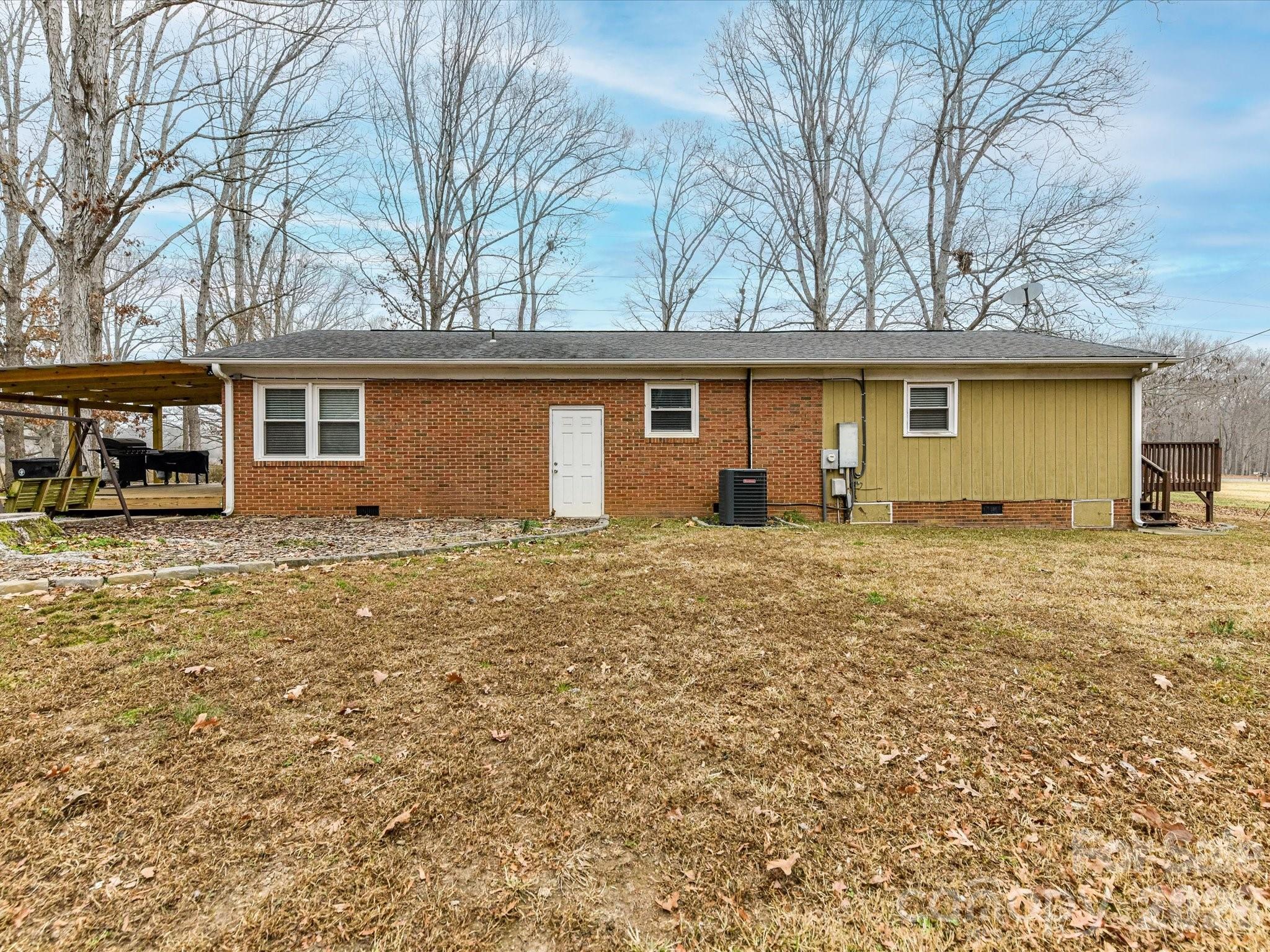 2303 Long Hope Road Monroe, NC 28112 - Photo 31 of 33 front view of house with a yard