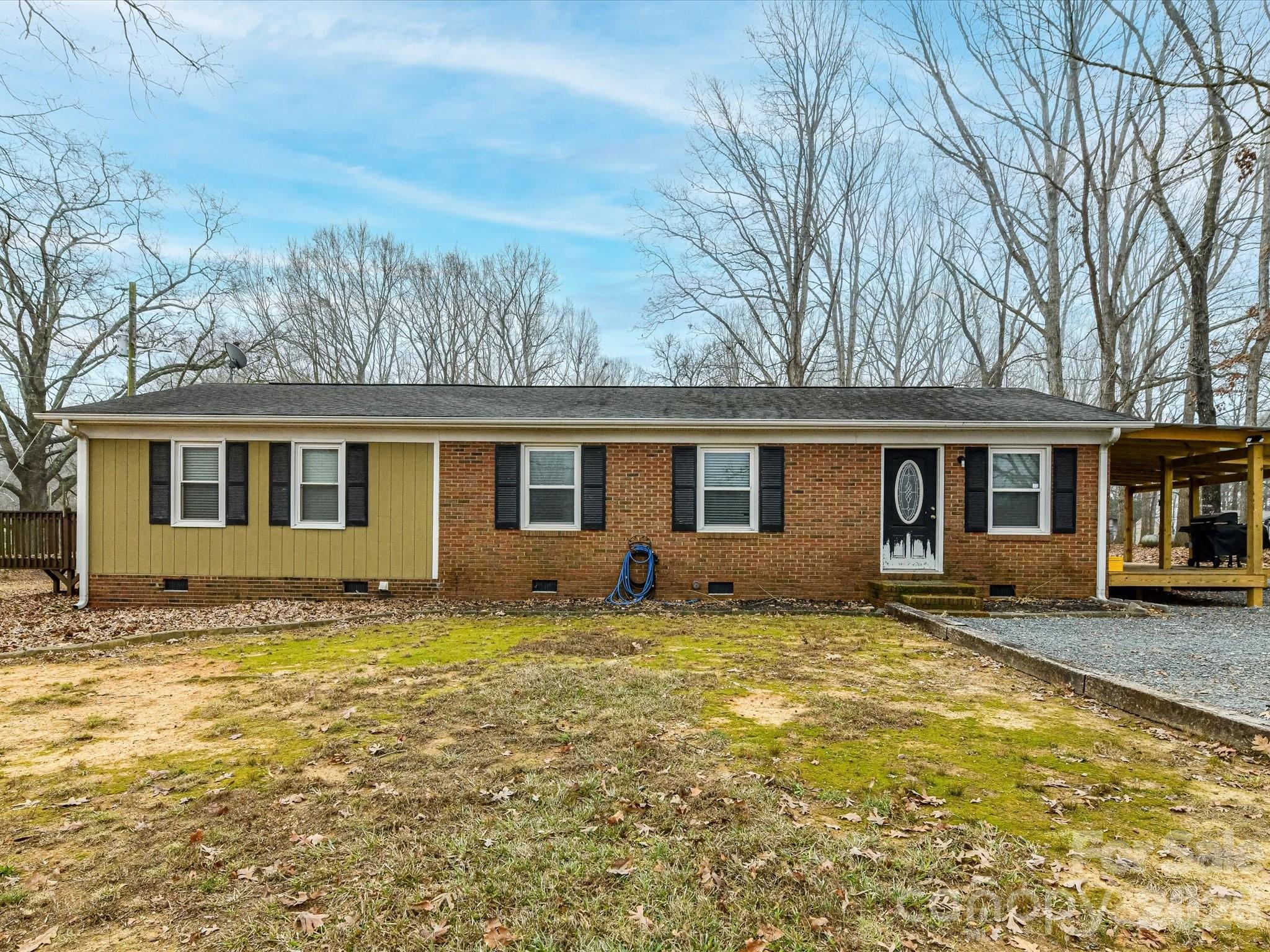 2303 Long Hope Road Monroe, NC 28112 - Photo 33 of 33 a view of a house with a yard