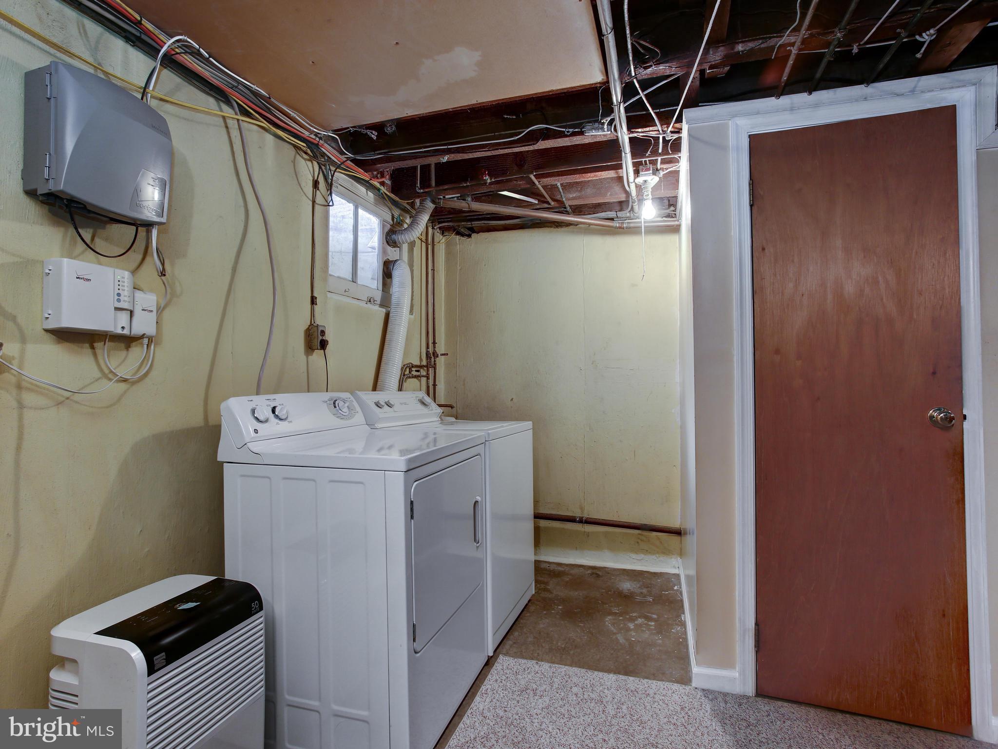 521 Achille Road Havertown, PA 19083 - Photo 20 of 24 Laundry and door to Powder Room